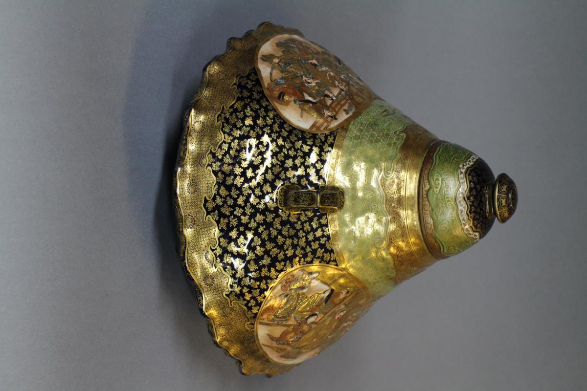 A large Japanese 19th century mount Fuji shaped Satsuma vase and cover
