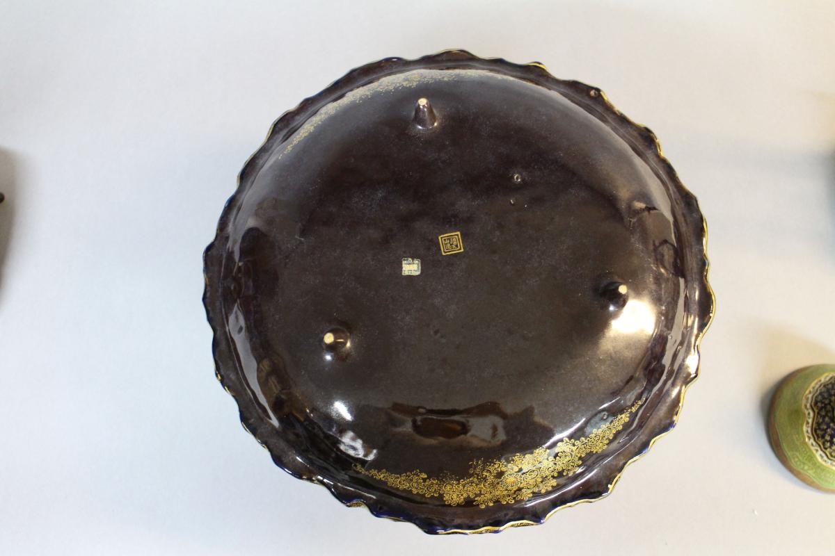 A large Japanese 19th century mount Fuji shaped Satsuma vase and cover