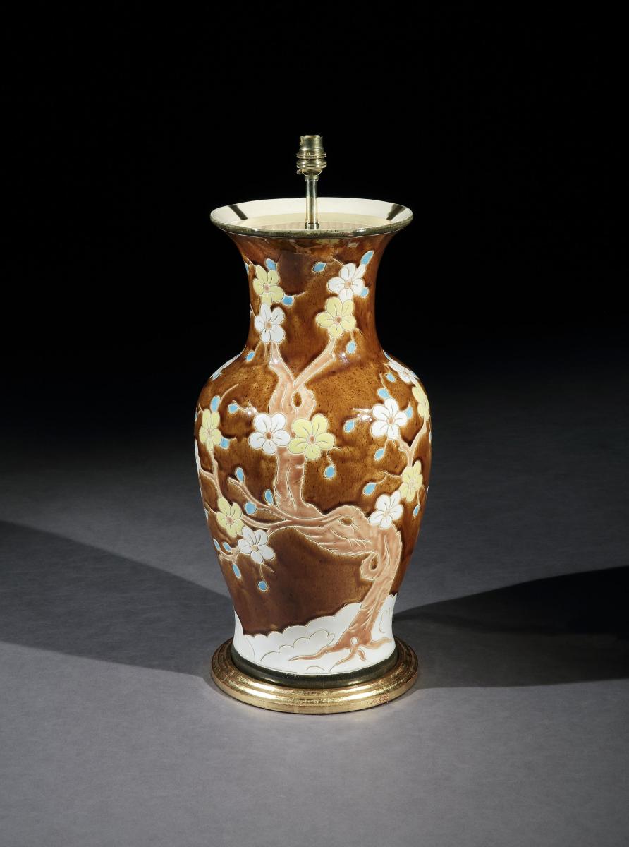 A Brown Ceramic Vase with Floral Vase
