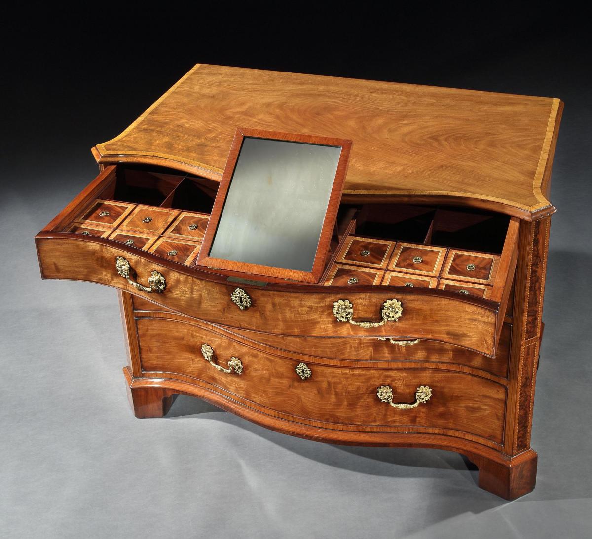 A George III Mahogany Chest of Drawers in the manner of Thomas Chippendale