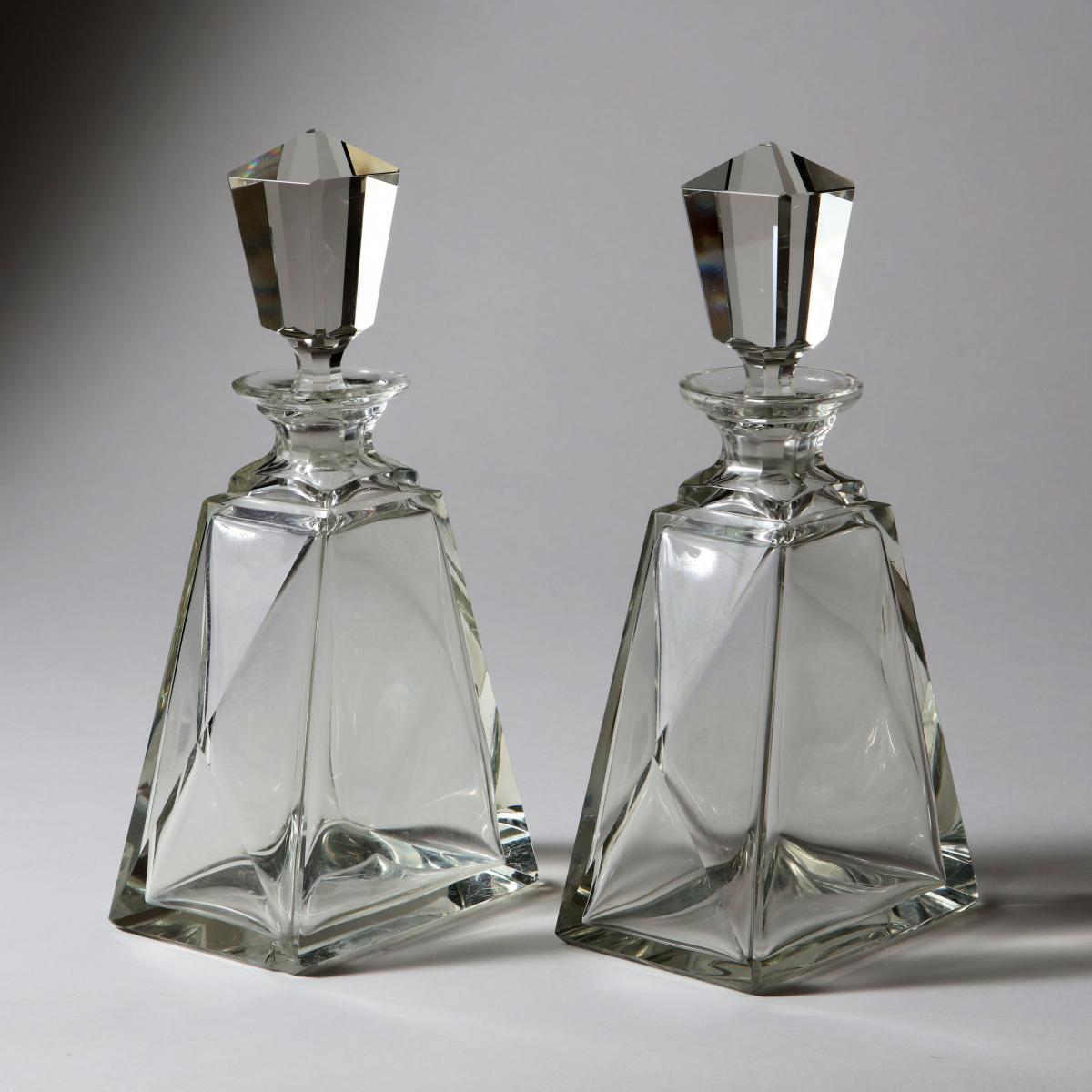 A pair of cut glass Art Deco spirit decanters