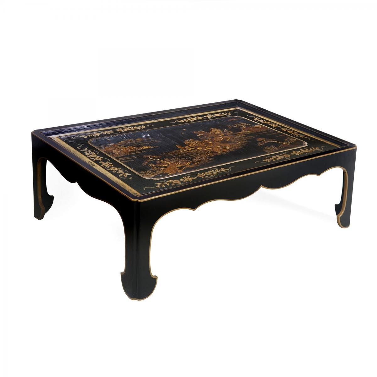 A low table with a 19th century Chinese lacquer panel