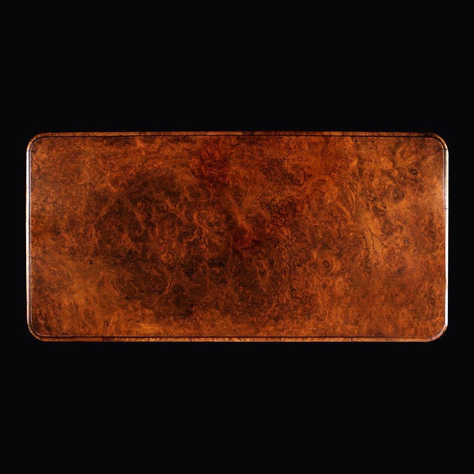 A mid 19th century burr walnut card table