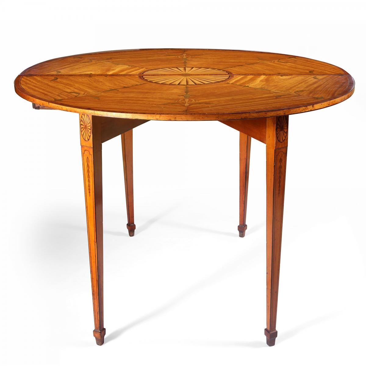 A fine quality Adam period satinwood and marquetry tea table