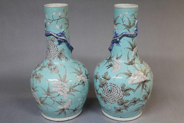 A pair of 19th century chinese pale blue vases
