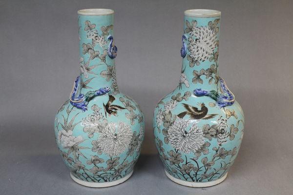 A pair of 19th century chinese pale blue vases