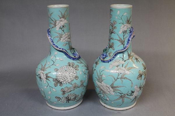 A pair of 19th century chinese pale blue vases