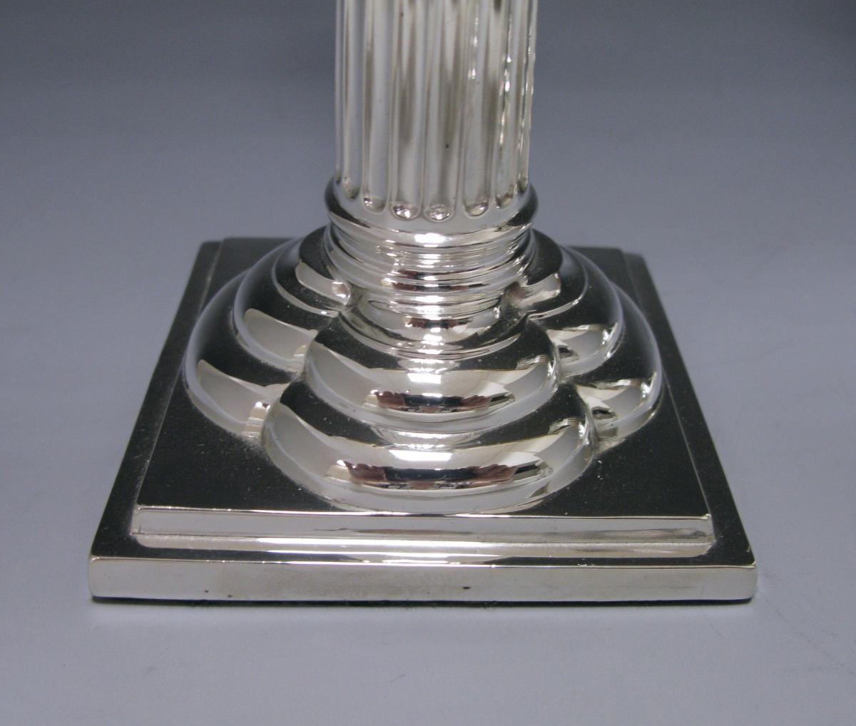 A Pair of Victorian Sterling Silver Candlesticks