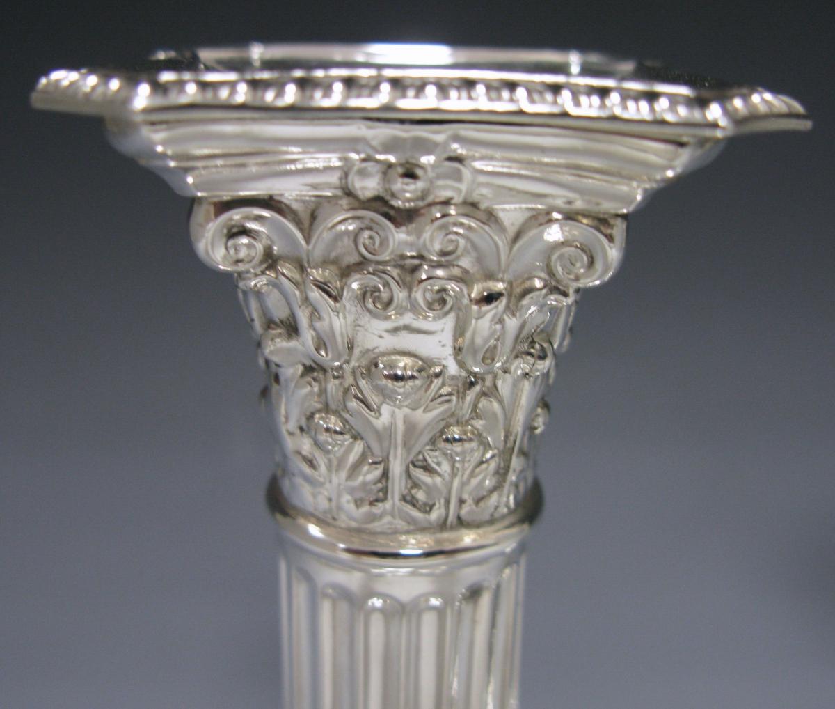 A Pair of Victorian Sterling Silver Candlesticks