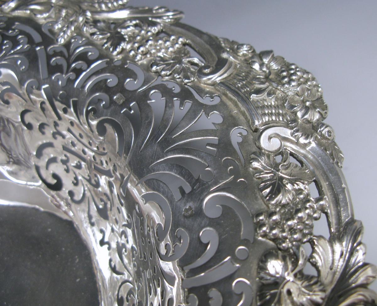A George II Antique Silver Swing –Handled Basket
