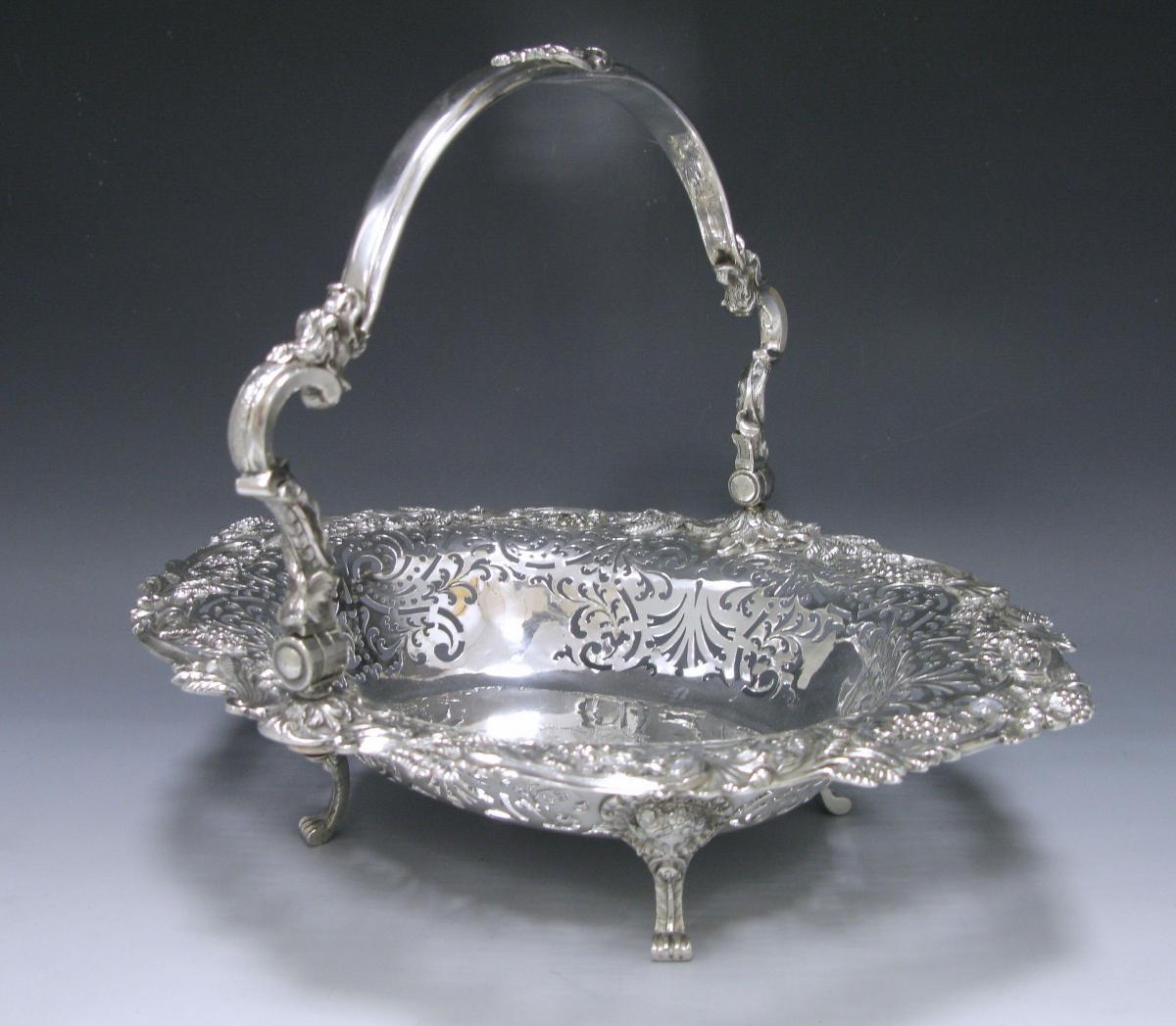 A George II Antique Silver Swing –Handled Basket