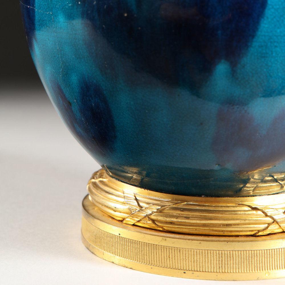 A VARIEGATED BLUE GLAZE VASE AS A LAMP