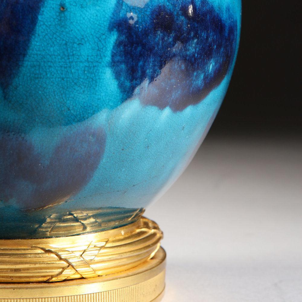 A VARIEGATED BLUE GLAZE VASE AS A LAMP