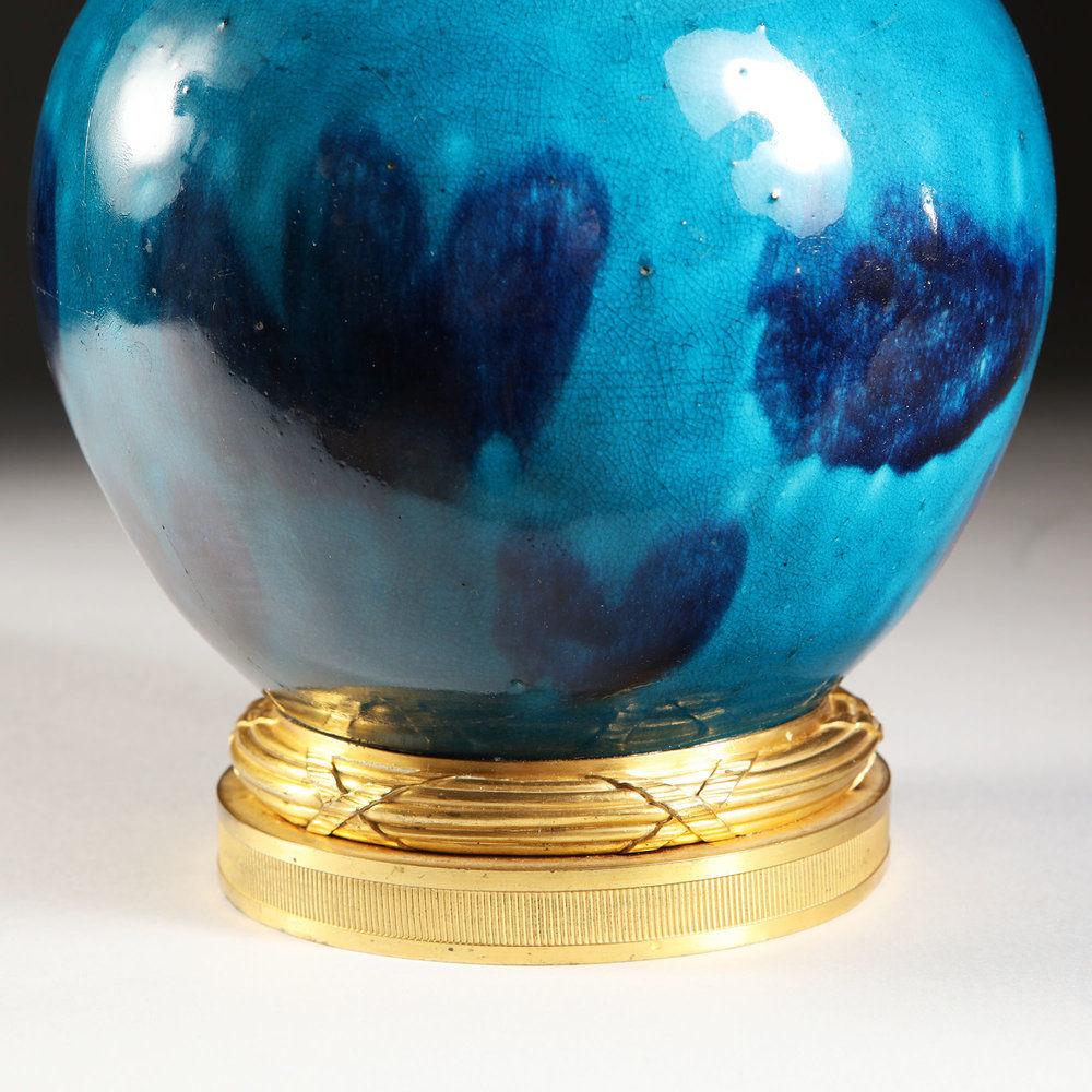 A VARIEGATED BLUE GLAZE VASE AS A LAMP