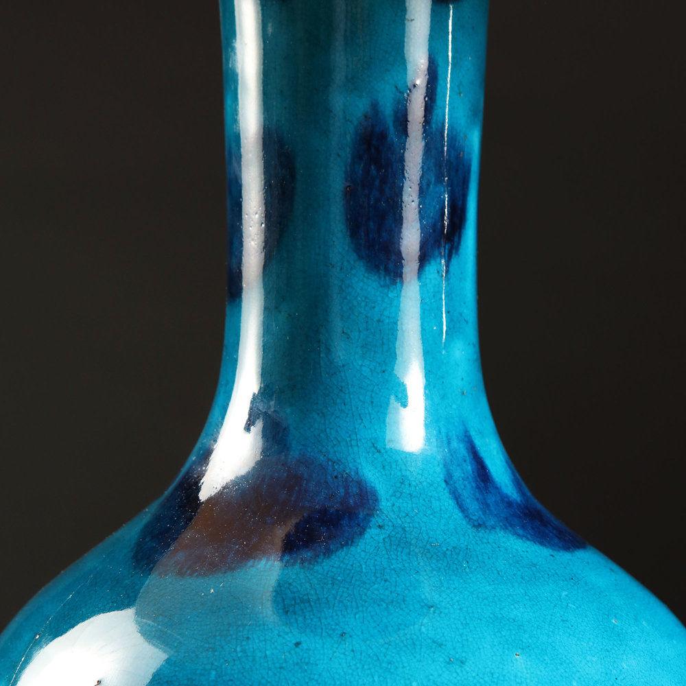 A VARIEGATED BLUE GLAZE VASE AS A LAMP