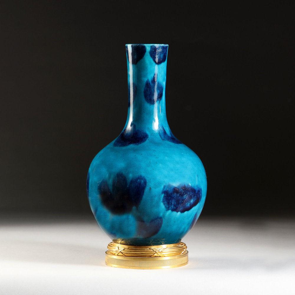A VARIEGATED BLUE GLAZE VASE AS A LAMP