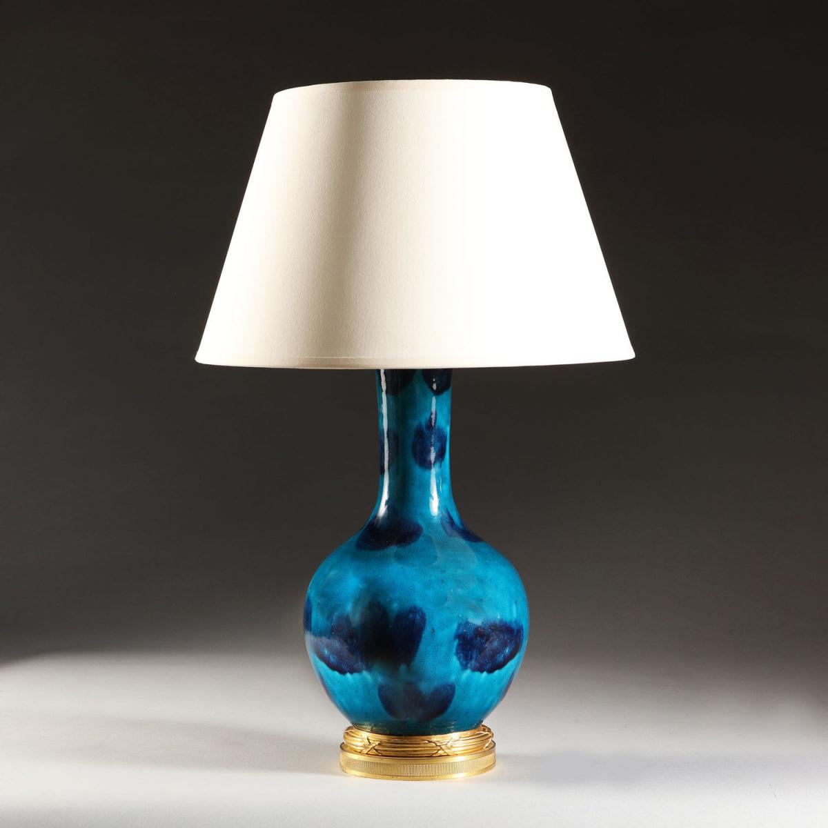 A VARIEGATED BLUE GLAZE VASE AS A LAMP