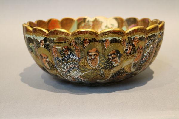 A 19th century japanese satsuma bowl of ribbed form