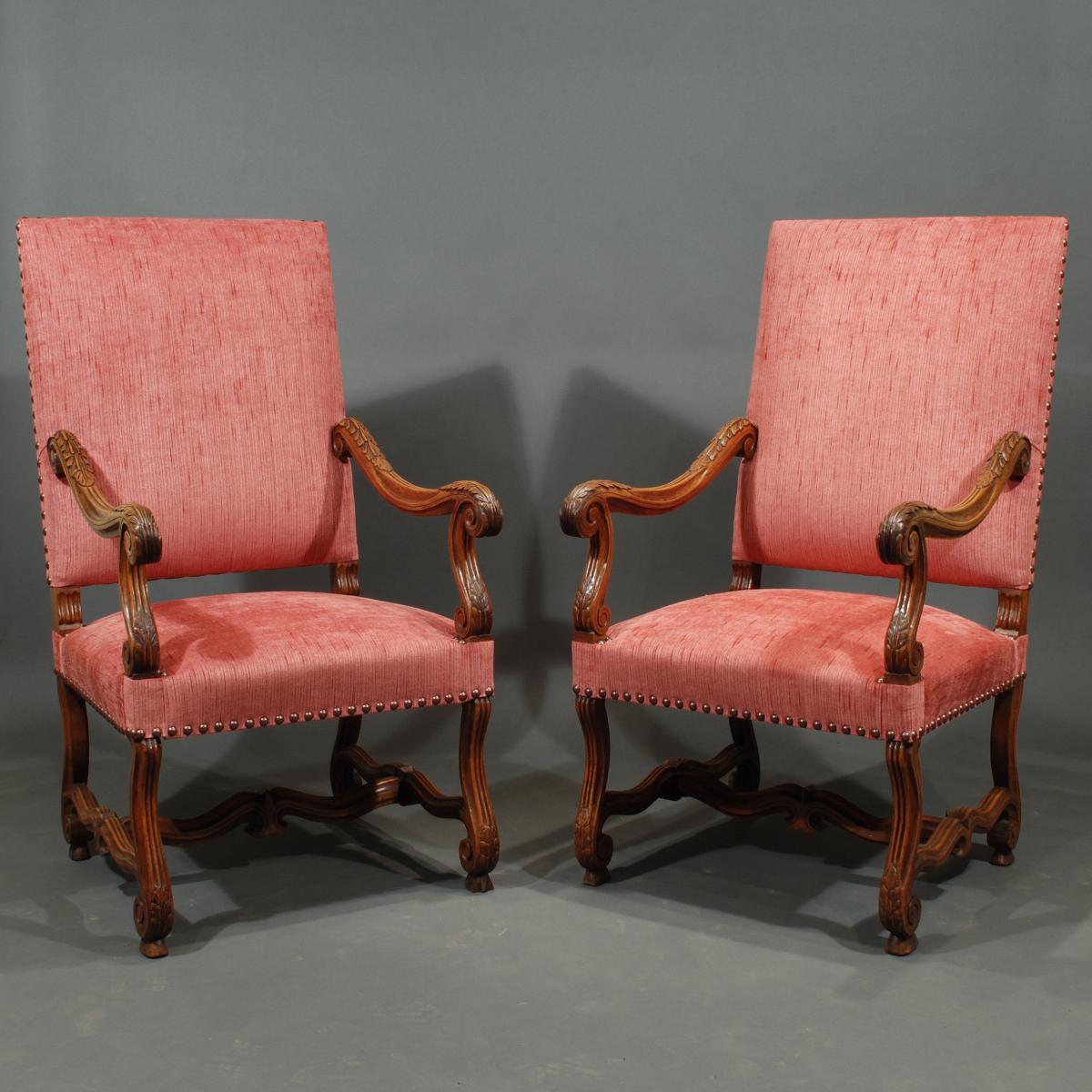 A Pair of Louis XIV Style Walnut Jambes de Mouton Arm Chairs