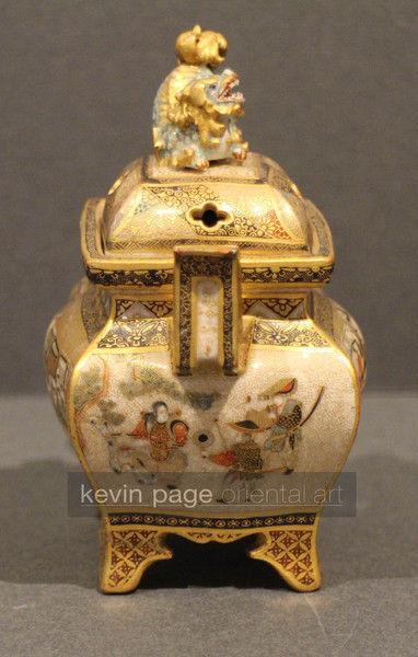 a japanese satsuma koro decorated with a lion dog