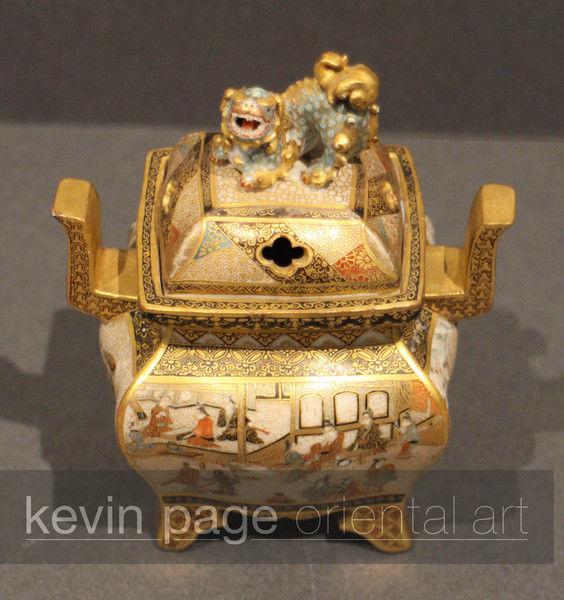 a japanese satsuma koro decorated with a lion dog