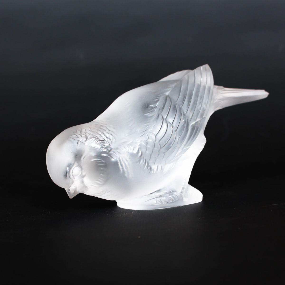 Moineau Timide, an Art Deco glass bird paperweight. A frosted glass figure of a sparrow pecking for food. Model number 1166. Lit