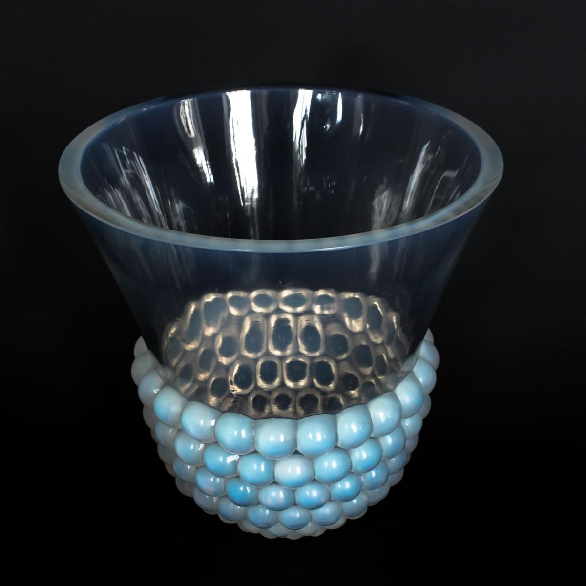 Graines, an Art Deco opalescent glass vase with a raised motif of blossoms. Literature: Marcilhac, R Lalique Catalogue Raisonné