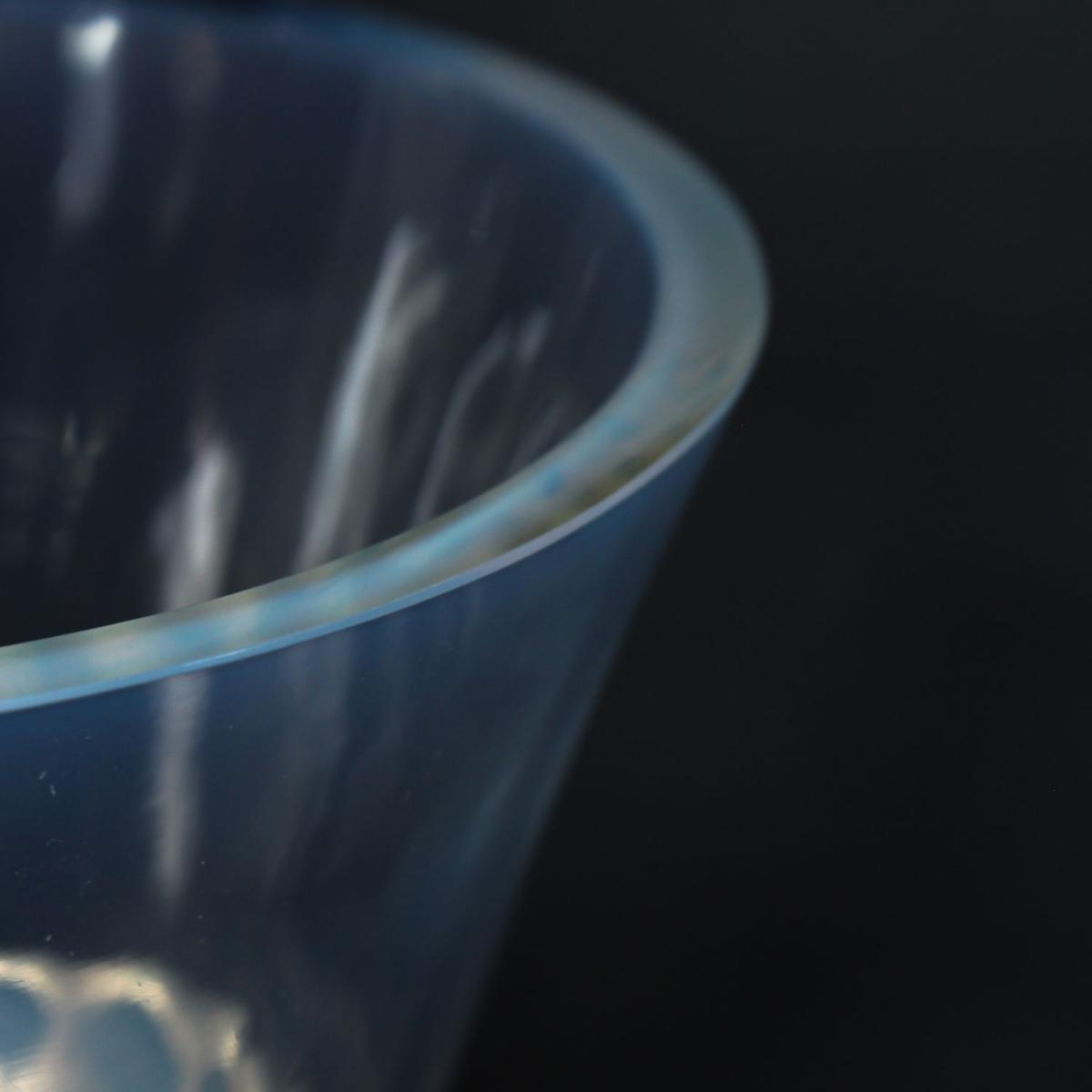 Graines, an Art Deco opalescent glass vase with a raised motif of blossoms. Literature: Marcilhac, R Lalique Catalogue Raisonné