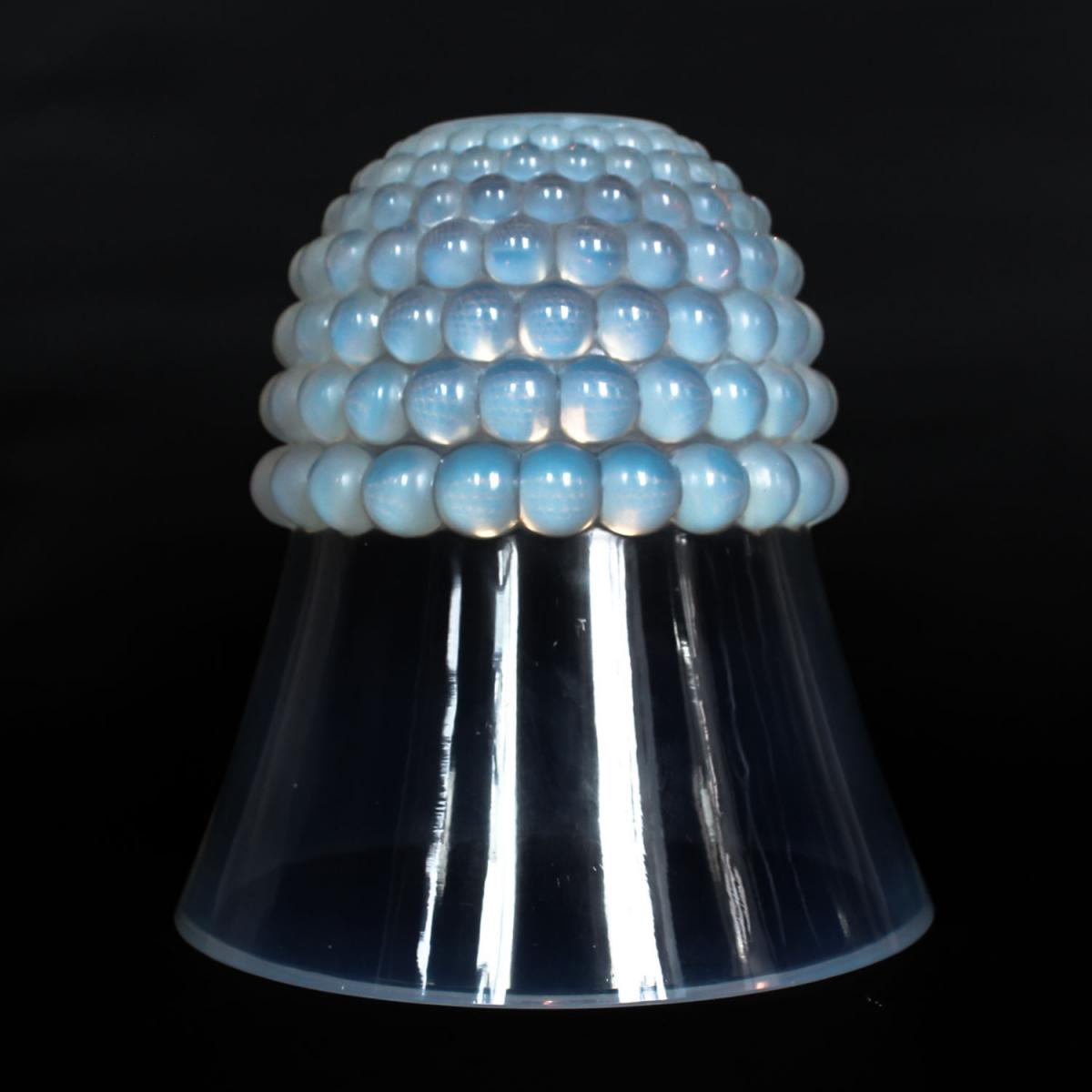 Graines, an Art Deco opalescent glass vase with a raised motif of blossoms. Literature: Marcilhac, R Lalique Catalogue Raisonné