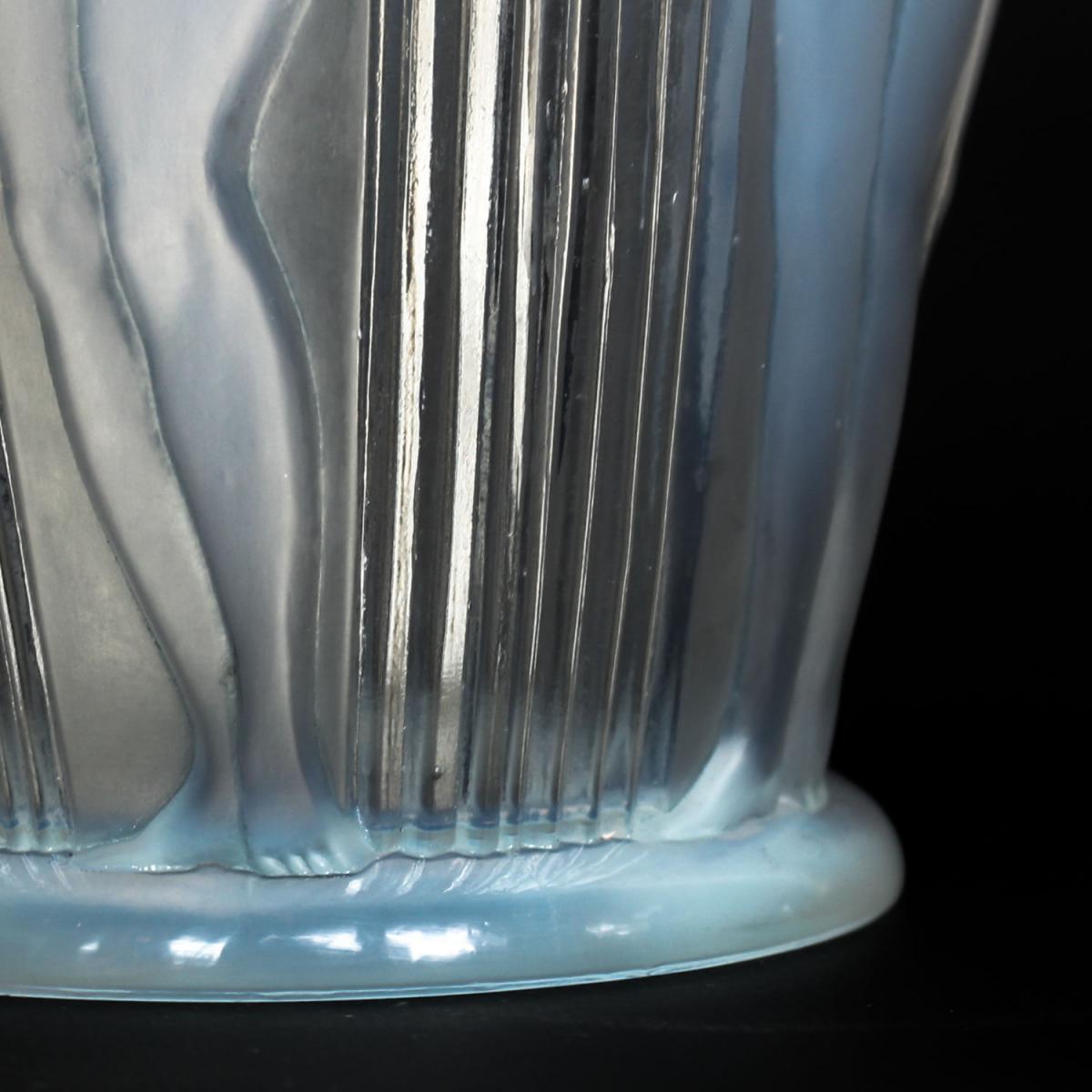'Danaides', an Art Deco frosted, opalescent glass vase by René Lalique (1860-1945). Decorated over with raised figures of daught