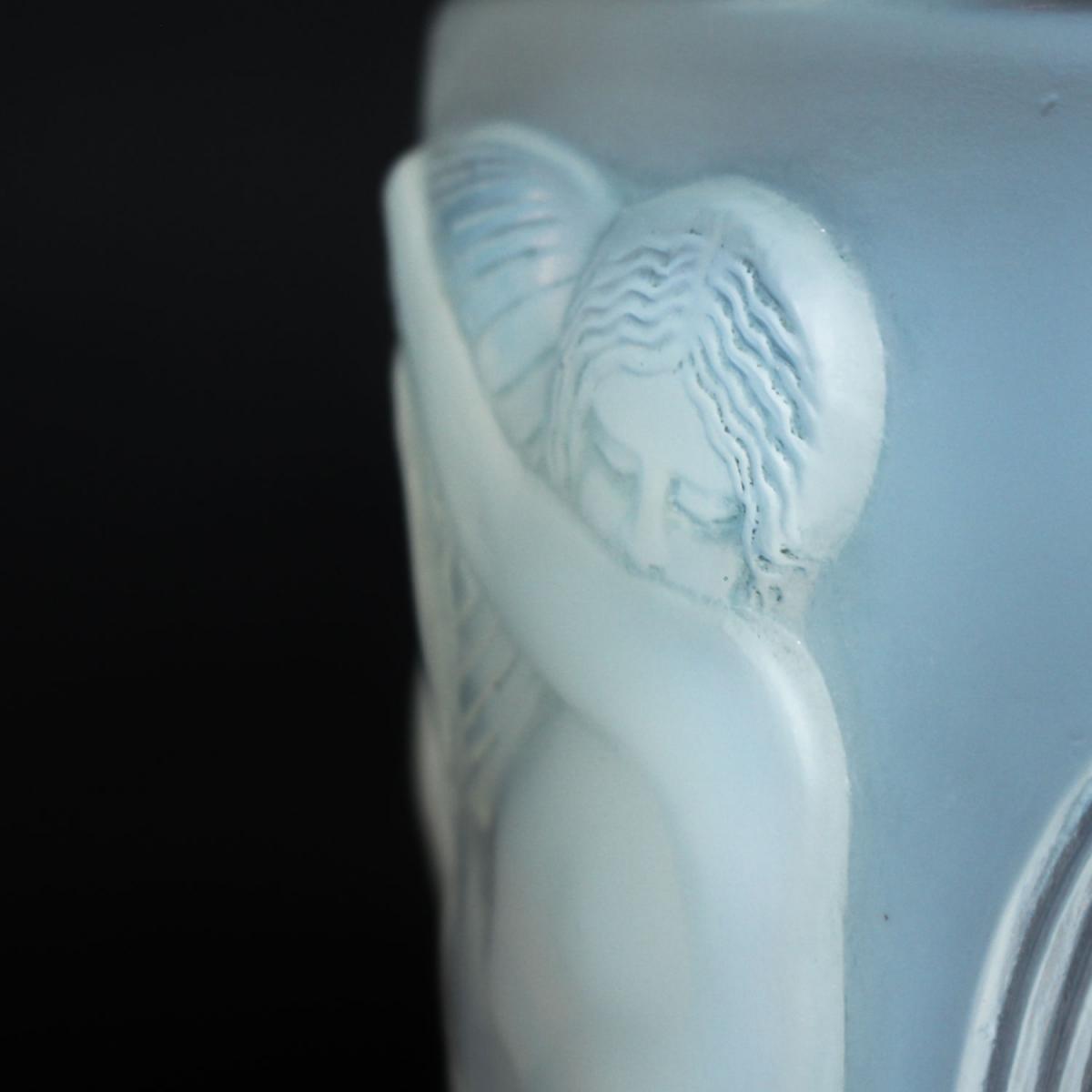 'Danaides', an Art Deco frosted, opalescent glass vase by René Lalique (1860-1945). Decorated over with raised figures of daught