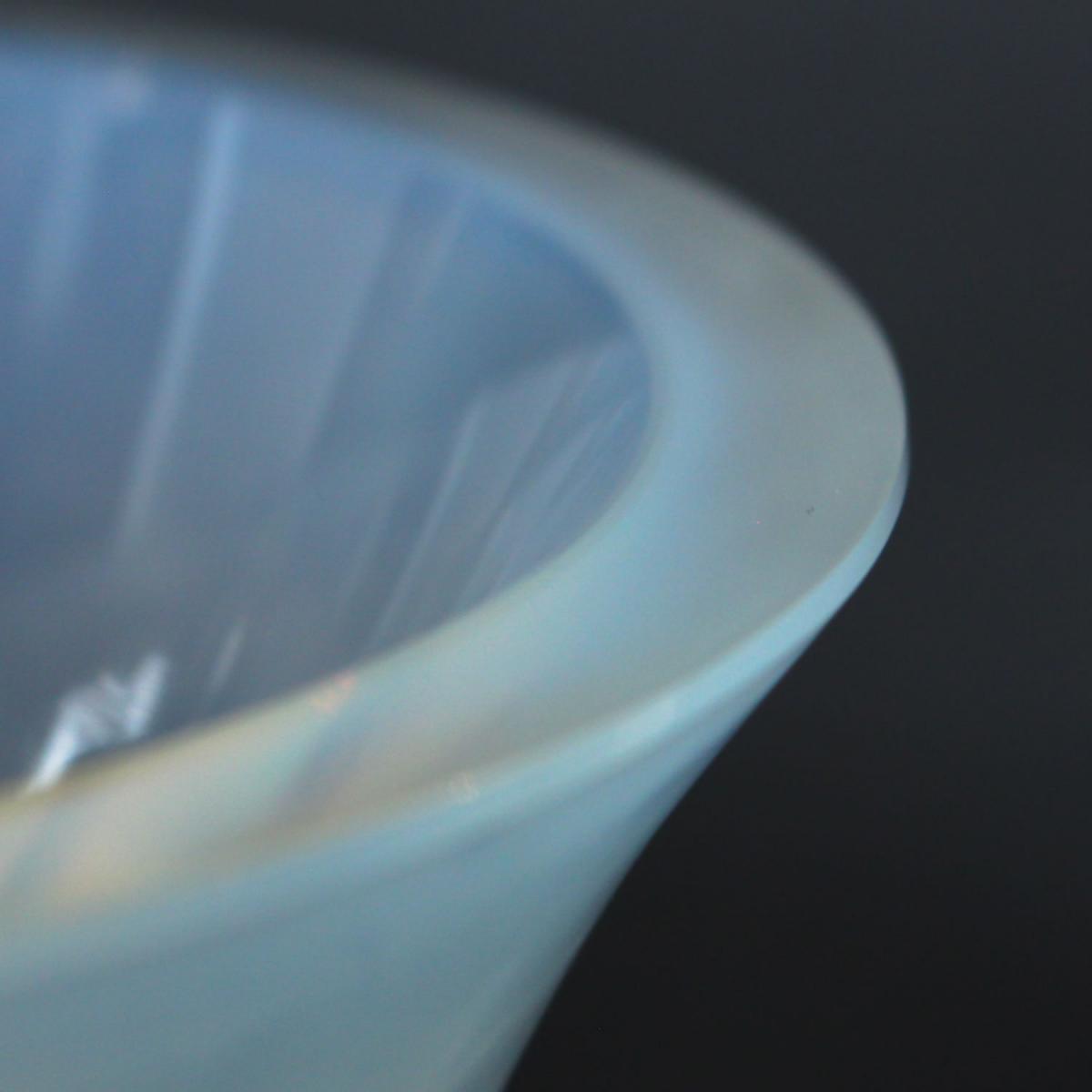 Feuilles, an Art Deco opalescent and moulded glass vase by René Lalique. Relief decorated with raised hearts. Stencil etched R