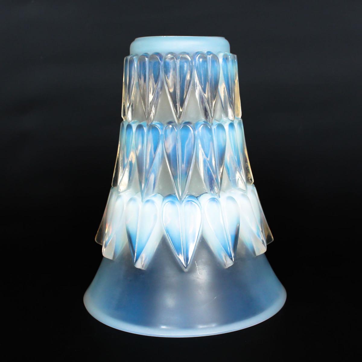 Feuilles, an Art Deco opalescent and moulded glass vase by René Lalique. Relief decorated with raised hearts. Stencil etched R