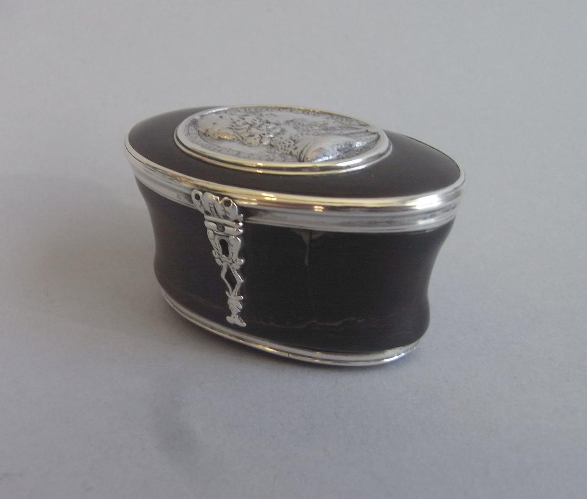 An important William III silver mounted Tortoiseshell Commemorative Standing Snuff Canister, inset with a cast Commonwealth Roya