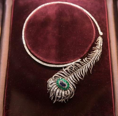 A diamond set antique jewellery necklace in the form of a feather