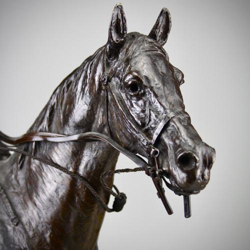 Detail of Sydney March equestrian bronze group.