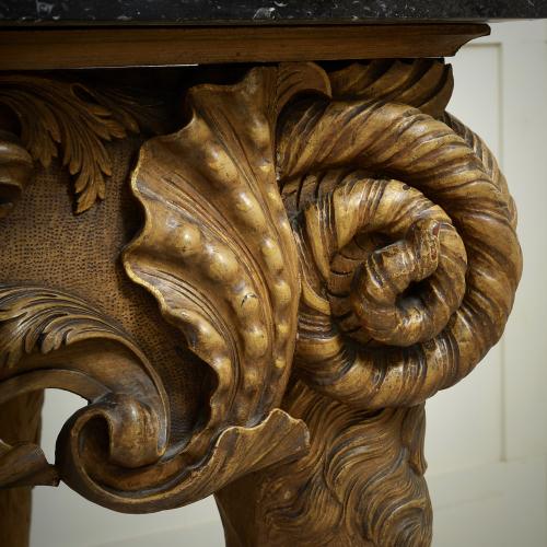A massive Irish George II buff-painted side table with original Kilkenny fossil marble slab, circa 1740.